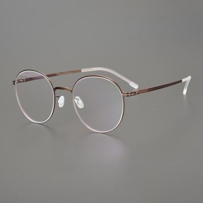 China Hot Selling Light Glasses Sight Glasses Men's And Women's Factory Simple And Stylish Anti-blue Light Metal Screwless for sale