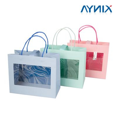 China XINYA Recyclable Hot Selling Products Customized Window Gift Favor Shopping Clear Paper Bag for sale