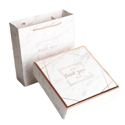 China Recyclable Custom Logo White Marble Packaging Boxes Cajas De Confectionery Packaging Gift Box With Bag for sale