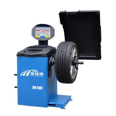 China SM-B182 Auto Tire Balancer Machine With Foot Brake Cars Motorcycle SUV Tire Rubber Cover Modes 990*760*1150mm for sale