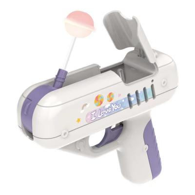 China Package Candy Inside Yohi Creatives Light Up Sugar Vending Surprise Lollipop Blaster Hand Candy Gun Toys 2021 for sale