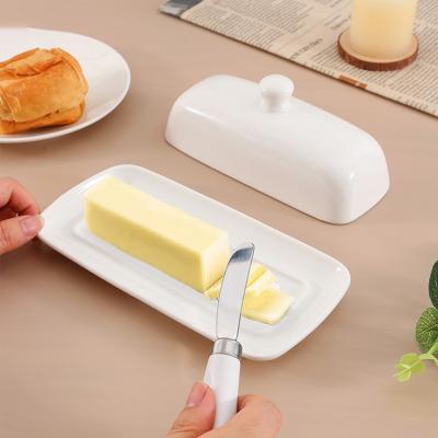 China Simple Design Rectangle Eco Friendly White Butter Tray Simple Design French Ceramic Butter Dish With Lid And Knife for sale