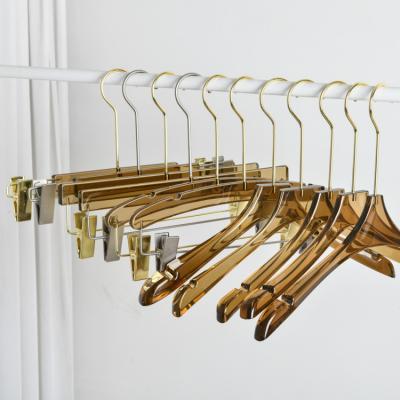 China Tea Color Durable Free Logo Acrylic Coat Hanger Suits Custom Goods Clothes Clear Acrylic Hanger With Hook for sale