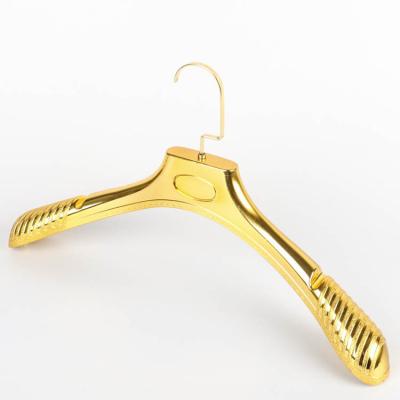 China Goods Customized Cheap Plastic Non Slip Assembled Men Hangers Gold Color Velvet Suit Hanger For Cloth for sale