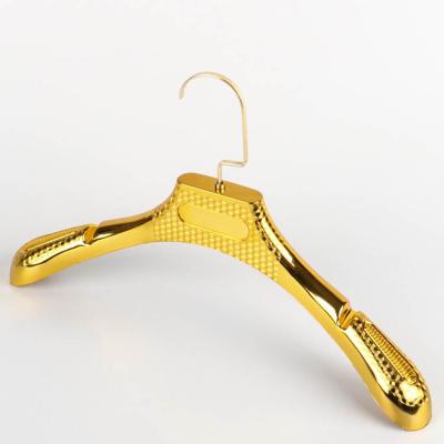 China Factory wholesale women gold color durable non slip velvet plastic assembled hangers for clothes and coat for sale