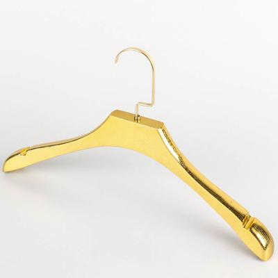 China Wholesale Durable Gold Coat Non Slip Plastic Hanger Women Custom Logo Gold Plastic Hanger With Hooks for sale