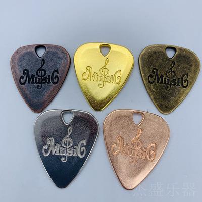 China Popularity Guitar Accessories Rack Picks Metal Acoustic Guitar Picks Border Electric Guitar for sale