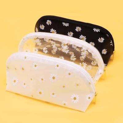 China Fashion Shinny Daisy Transparent Make Up Organizers Clear Zipper Cosmetics Travel Toiletry Bag PVC Makeup Bag Custom for sale