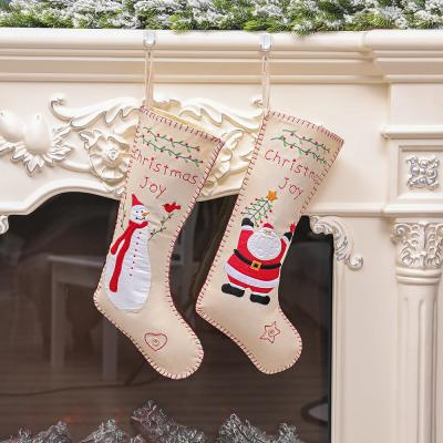 China Snowman Christmas Ornaments Embroidery Christmas Canvas Stockings As Gift Pendant Bag for sale