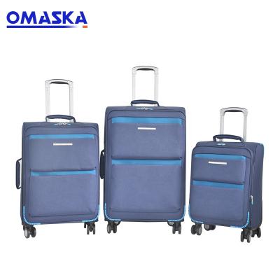 China OMASKA Custom Nylon Travel Bag 20 24 28 Inch Trolley Mount Filters Spinner Luggage Set Travel Bags for sale