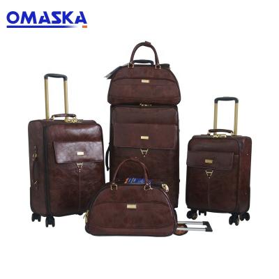 China Omaksa Custom 5 Pcs Set Luggage OEM ODM Men PU Suitcase for sale