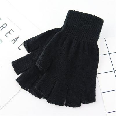 China Solid Elastic Half Finger Gloves Unisex Black Warm Elastic Winter Elastic Knit Fingerless Gloves For Men And Women for sale