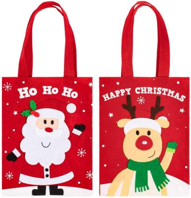 China Eco-Friendly Red Christmas Tote Gift Bag Reusable Non-Woven Thickened Candy Bag-Santa Claus Reindeer Design Shopping Bags (2 pieces) for sale