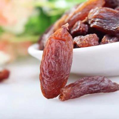 China Seeds China Wholesale Price Certificate Dried Raw Raisins Seedless Black Peeler for sale