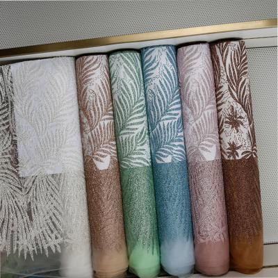 China Viable; Water Soluble Luxury Shiny Glitter Embroidered French Tulle Lace Fabric For Women Dresses Sugar Lace Fabric for sale