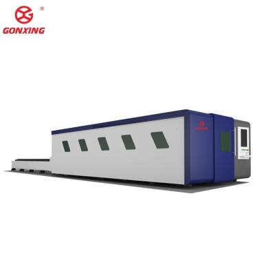 China 30mm Cutting Thickness Fully Enclosed Fiber Laser Metal Cutting Machine and Exchangeable Table for Cutting Tube Metal Materials for sale