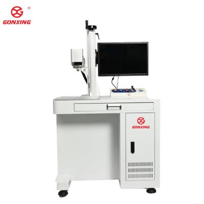 China Máquina de gravura a laser de jóias de ouro e prata GXLASER 20W/30W/50W Marcação a laser de fibra de escritório com área de marcação 200mm*200mm à venda