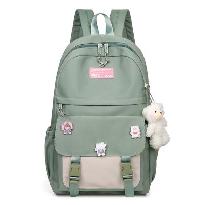 China Fashionable Universal Rucksack Color Contrast Backpack Bear Large Capacity Student Schoolbag 501 Pendant Waterproof Exquisite Design for sale