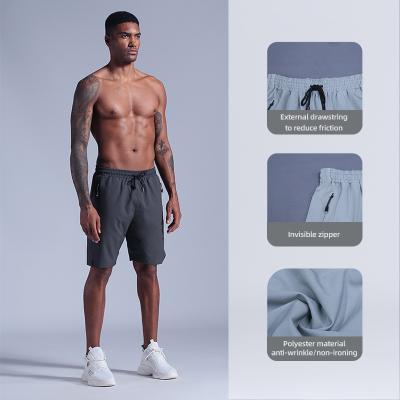 China Custom Anti-wrinkle Summer Wear Outdoor Loose Athletic Men's Fitness Breathable Basketball Shorts With Pocket for sale