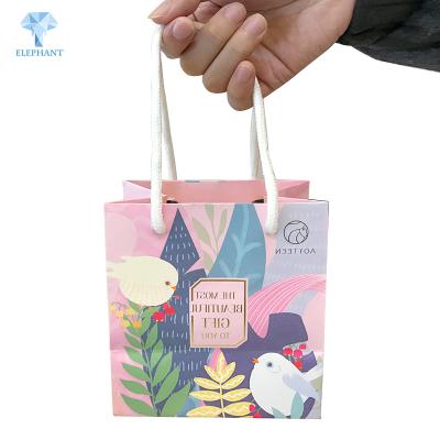 China Recyclable Slogan Customized Small Biodegradable Paper Bag With Handle for sale