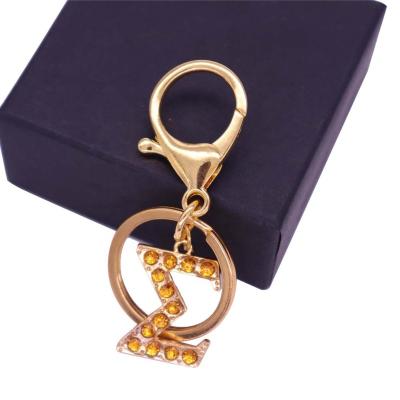 China Eco-Friendly Metal Inlaid Letters Greek Sigma Sorority Key Chain Key Rings For Women Bags for sale