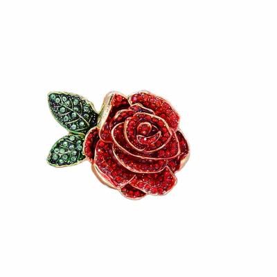 China Eco-friendly Alloy Quality Metal Heavy Design 3D Flower Shape Pin Red Diamond Crystals Green Leaf Rose Brooches Jewelry Custom for sale