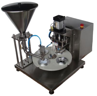 China Rotary Type Food Manual Heat Seal PP PET Cup Calippo Ice Cream Filler Sealer Plastic Packaging Machine for sale