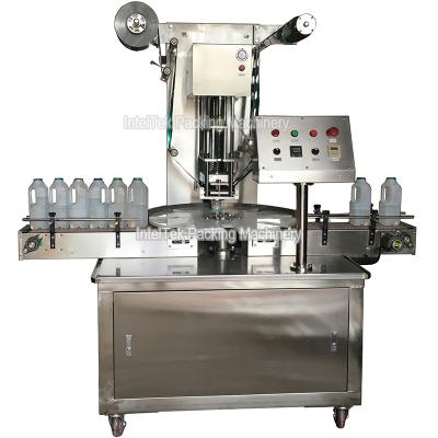 China KIS-1800 Food Rotary Type Juice Milk Bottle Filling Sealing Machine for sale