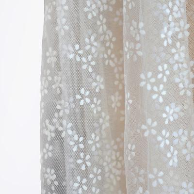 China Breathable Polyester puff print flower pattern flock tulle fabric for sale