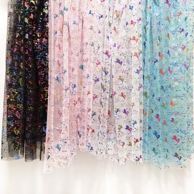 China Breathable Rainbow color unicorn design foil printed tulle for sale