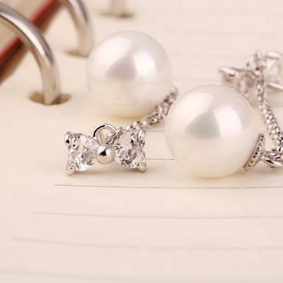 China 2021 FASHIONABLE Korean Original Bow Zircon Jewelry Earrings Fringe Long Pearl Pendant for sale