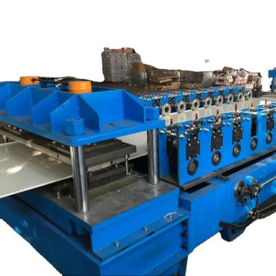 China Building Material Shops Steel Panel Wall Rolling Shutter Door Machine Roll Forming Machine For Supermarket Shelves for sale