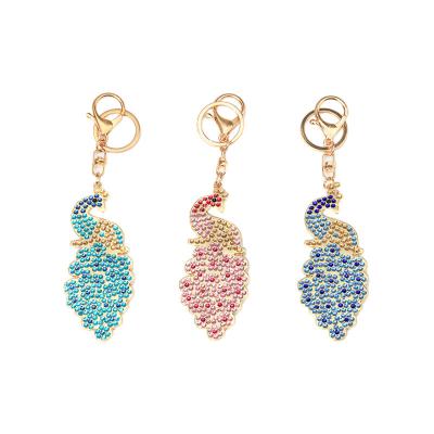 China New Korean Version Korean Crystal Keychain Diamond Peacock Keychain Elegant Bag Pendant Purse Ornaments For Girl for sale