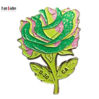 China Custom Glitter Design Flower Europe Pin With Luminous Colors Stamping Soft Enamel Badge for sale