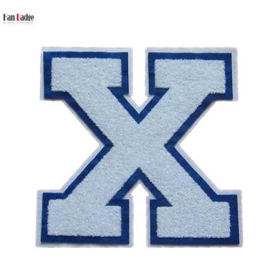 China Letter X Durable Custom Chenille Patches Sew On Embossed Applique Badges For Apparel for sale