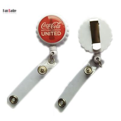 China ABS Plastic Bottle Cover Shape Retractable Badge Reels With Epoxy Doming Customized Logo And Back Clip for sale