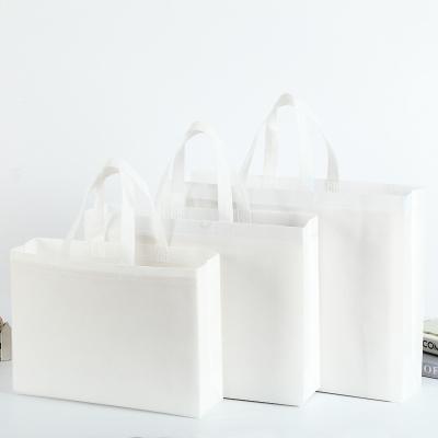 China Eco-Friendly Bulk Blank White Nonwoven Tote Bags For DIY Craft Gifts Grocery Gifts for sale