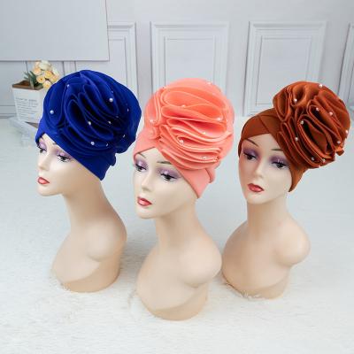 China 2022 fashion wholesale african blue head wraps hijabs muslim women big flower turban hats with beads for sale