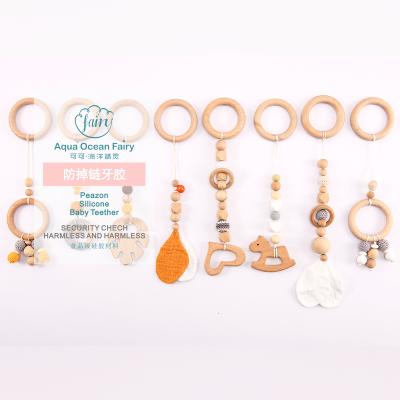 China Wholesale Easy Clean Wooden Baby Gym with Wooden Baby Teether Toys Foldable Play Gym Baby Hanging Toy for sale