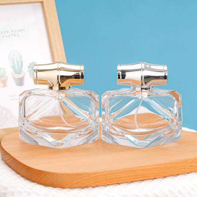 China Unique Custom Luxury High Qiality Empty Glass 80ml Clear Perfume Bottle for sale