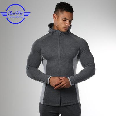 China Anti-pilling plain french terry gym men custom cut and sew color block hoodie for sale