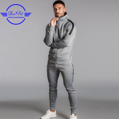 China Wholesale Anti-UV Mens Sportswear Plain Polyester Tracksuit Two Tone Fitted Mens Tracksuit for sale