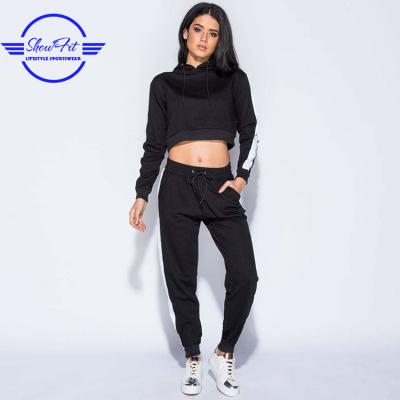 China Latest Design Anti-UV Women Crop Top Side Stripe Sports Tracksuit Two Piece Set Hoodie And Jogger Pants for sale