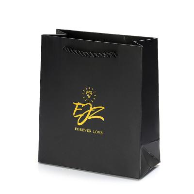 China Wholesale Luxury Eco - Friendly Durable Clothing Packing Paper Bags Custom Logo Printed Jewelry Gift Packaging Bag for sale