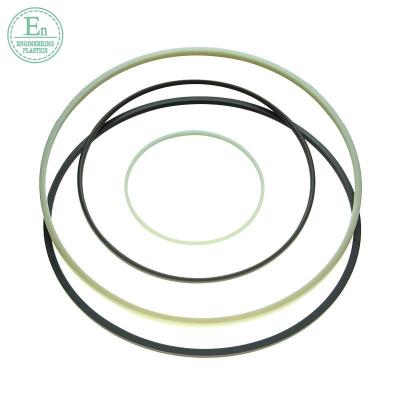 China Oil Resistant Hydraulic Cylinder Wear Plastic Rings To Seal Custom Hydraulic Self Lubricating Guide Ring Seals for sale