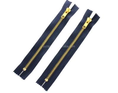 China Auto Lock # 5 Gold Metal Zipper Narrow End Zipper With Auto-lock Slider For Bags for sale