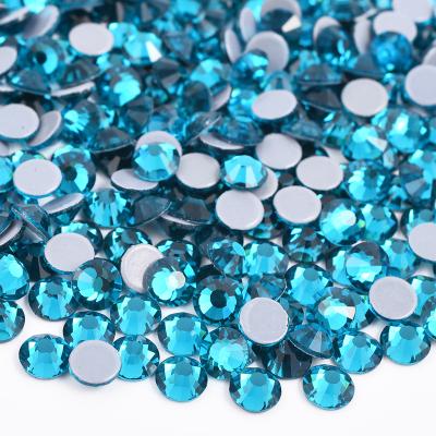 China Flatback Wholesale SS3 SS6 SS10 SS16 SS20 SS30 Blue Zircon Color Flatback Iron On Round Crystal Strass Hotfix Glass Rhinestones for sale