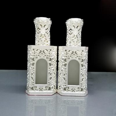 China 25ml Square Antique Silver Color Spray Perfume Bottle With Silver Outer Cap And Silver Plating Sprayer for sale