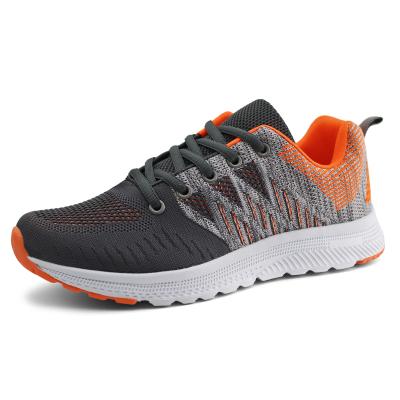 China PU Women Casual Breathable Fly Knit Fabric Sneakers Lightweight Running Tennis Shoes for sale