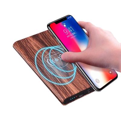 China High Capacity Custom Large Capacity Fast Charging 10000 MAH False Wood Grain Filling Plastic Wireless Power Supply for sale